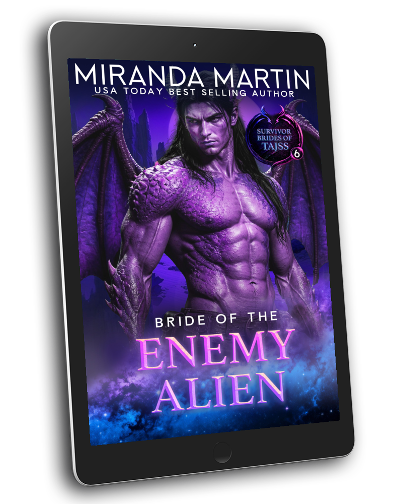 A tablet device displaying a romance novel cover titled "Bride of the Enemy Alien" by Miranda Martin, with fantasy artwork of a muscular winged man in purple tones.